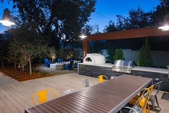 Barbecue pavilion featuring pizza oven and fire pit